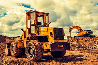 Vintage yellow Allis-Chalmers loader on construction site