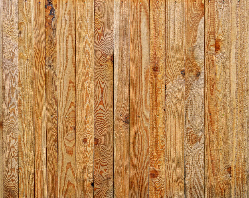 Vertical wooden plank texture background with natural grain