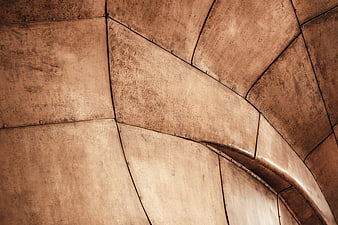 Abstract copper metal architectural texture with rivets