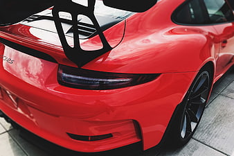 Rear View of Red Porsche GT3 RS with Large Spoiler