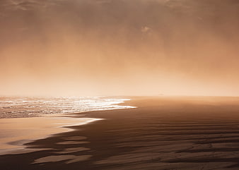 Serene Golden Hour Beach Landscape with Sandy Shores