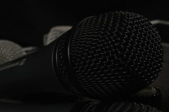 Close-up of black microphone mesh grille