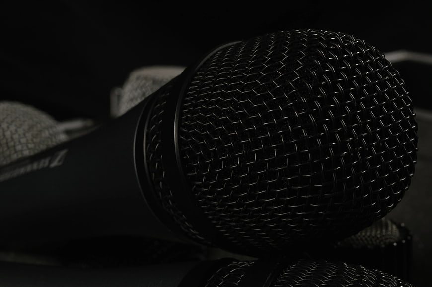Close-up of black microphone mesh grille