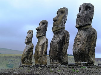 Four Moai Statues on Easter Island Under Overcast Sky