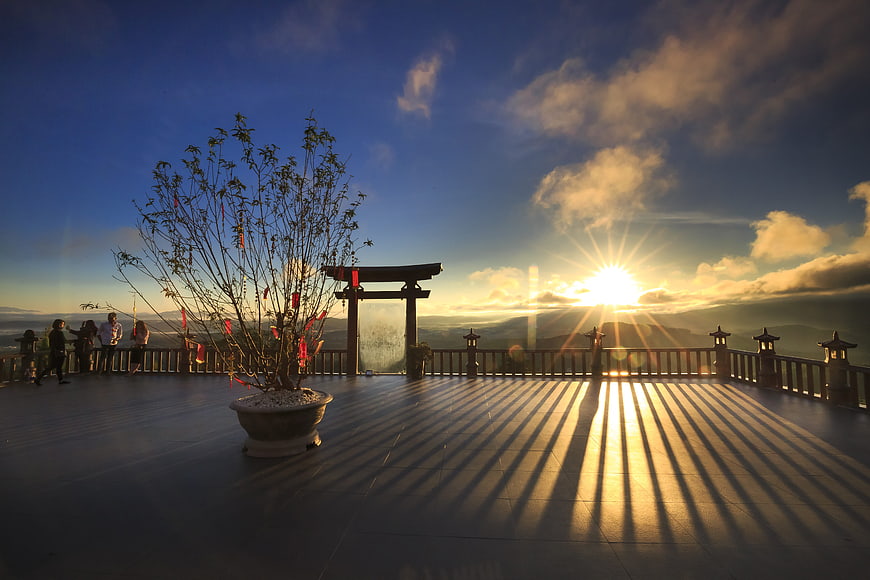 Sunset at Linh Phuoc Pagoda with Torii Gate and Mountain View