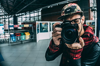 Young Photographer with Sony DSLR Camera