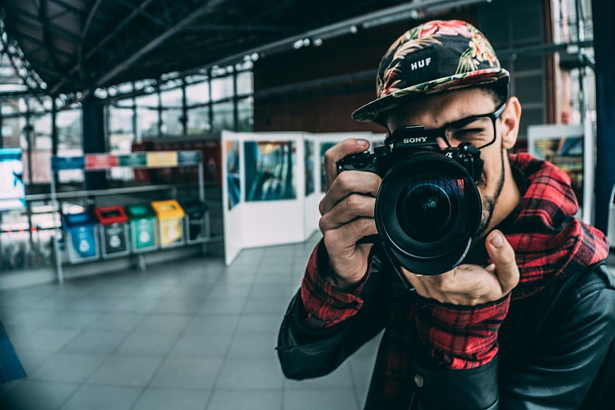 Young Photographer with Sony DSLR Camera