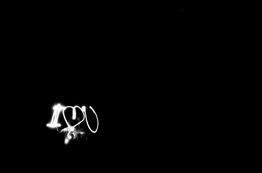 Light painting I love you text on black background