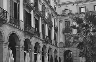 Black and white architecture of historic European building with balconies