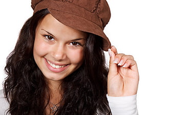 Smiling Young Woman Wearing Brown Hat Isolated on White