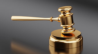 Gold Gavel And Sound Block On Dark Gray Background