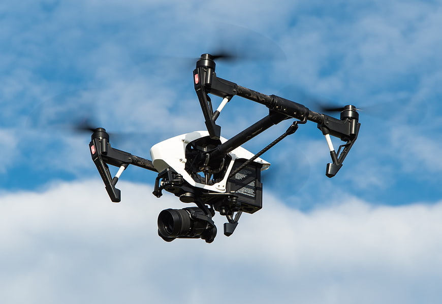Professional DJI Inspire 1 Drone Flying in Blue Sky