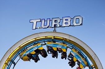 Turbo amusement park ride with people upside down