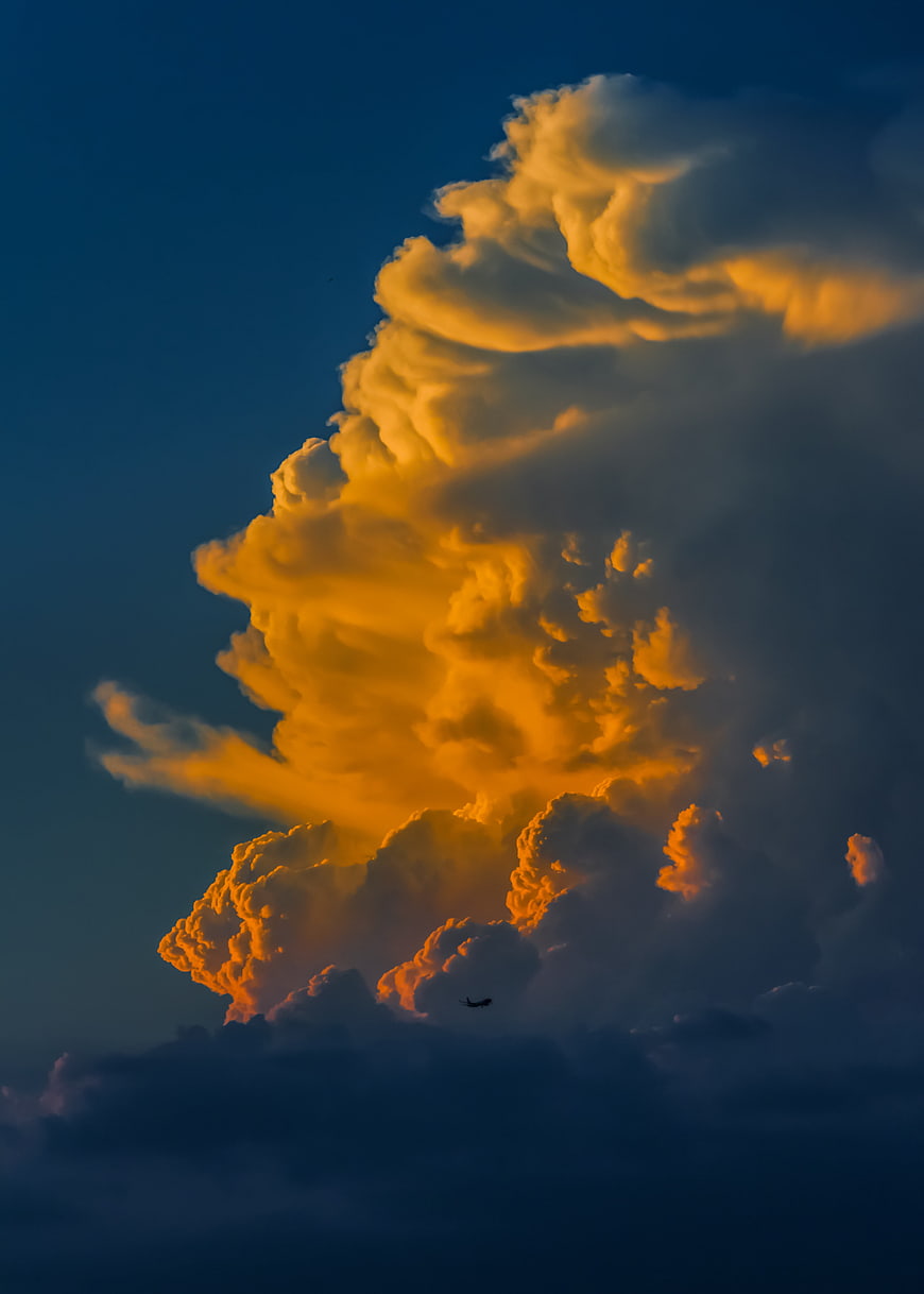 Dramatic Golden Cumulonimbus Cloud at Sunset
