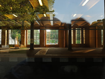 Modern Architecture Interior with Glass Reflections and Sunlight