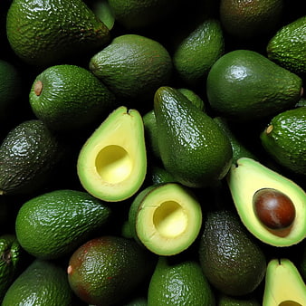 Fresh Green Avocados with Halves and Pit
