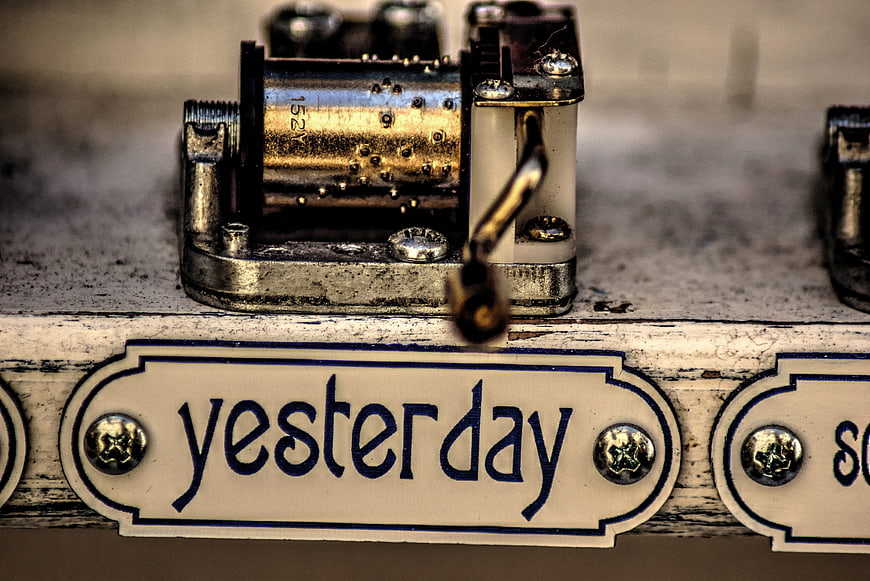 Close-up of vintage music box with yesterday label