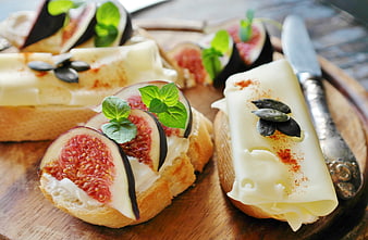 Gourmet Fig and Cheese Crostini on Wooden Board
