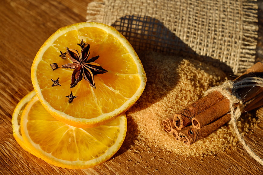Dried orange slices with cinnamon, star anise, and brown sugar