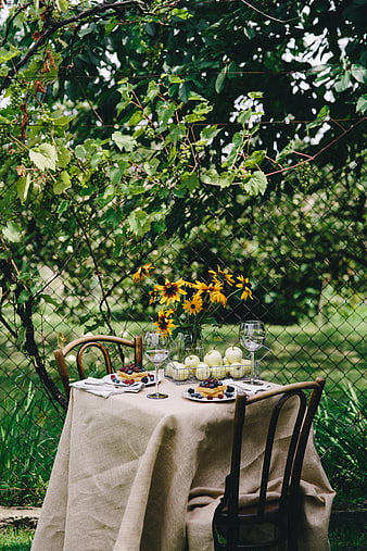 Rustic Outdoor Breakfast Table with Waffles and Flowers