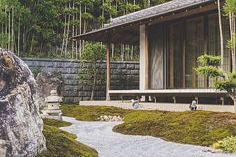 Serene Japanese Garden with Traditional House and Bamboo Forest