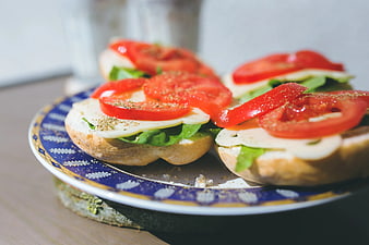 Fresh Caprese Sandwiches on Blue Patterned Plate