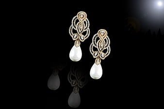 Luxury Rose Gold Pearl Drop Earrings on Black Background