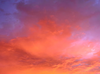 Vibrant Pink and Purple Sunset Sky with Dramatic Clouds