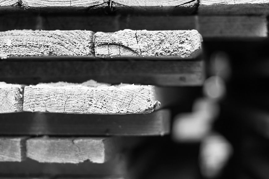 Close-up of weathered wooden planks in black and white