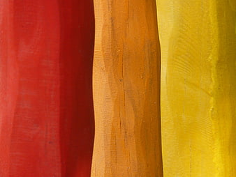 Abstract Vertical Stripes of Red, Orange, and Yellow Painted Wood