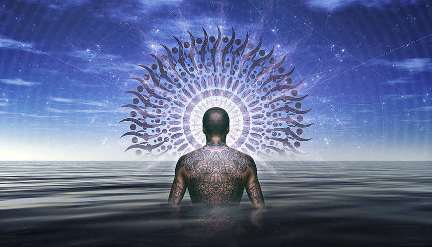 Tattooed Man in Water with Mystical Blue Energy Halo
