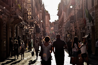 Tourists Walking Down Narrow Street in Naples Italy