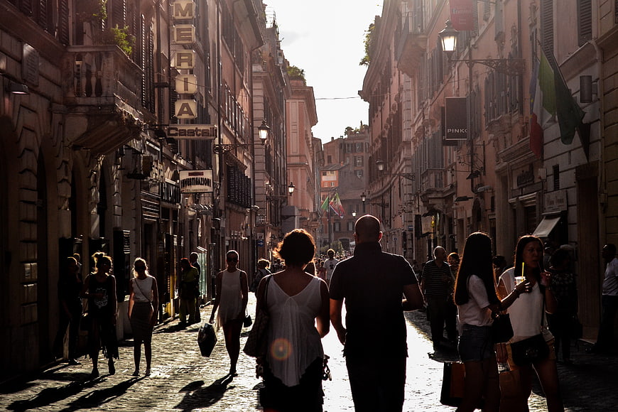 Tourists Walking Down Narrow Street in Naples Italy