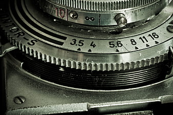 Close-up of vintage Contax camera lens aperture and focus rings
