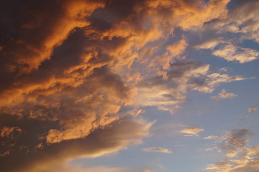 Dramatic Orange and Blue Sunset Clouds Sky Panorama