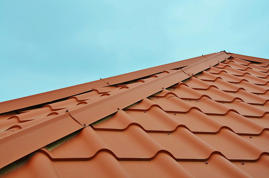 Terracotta Roof Tiles Against Blue Sky