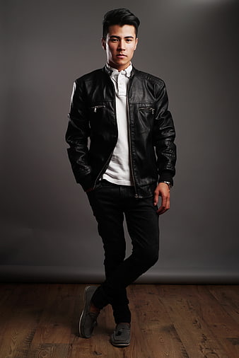 Handsome Asian Man in Black Leather Jacket Studio Portrait