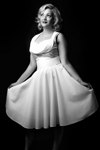 Elegant Black and White Portrait of Woman in White Dress