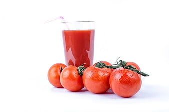 Fresh Tomato Juice with Ripe Tomatoes on White Background