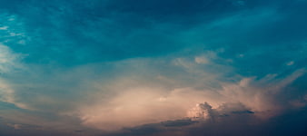 Dramatic Teal and Pink Clouds at Sunset