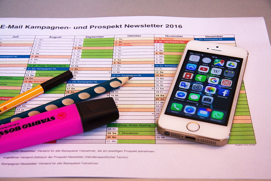 White iPhone 5 on 2016 Marketing Calendar with Highlighters