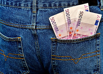 500 Euro banknotes in blue jeans back pocket