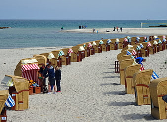 Traditional German Beach Huts on Sandy Coastline
