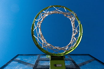 Low Angle View of Green Basketball Hoop Against Blue Sky