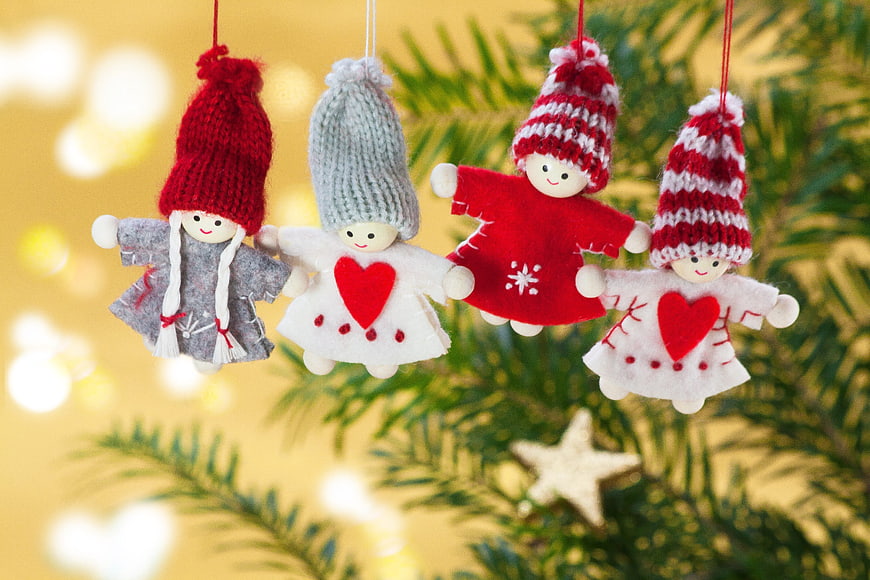 Handmade Felt Christmas Ornaments Hanging on Pine Branch