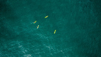 Aerial View of Kayakers on Turquoise Ocean Water