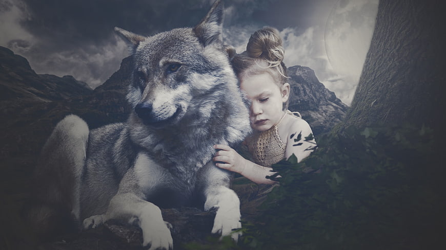 Young Girl Embracing Wolf In Dramatic Mountain Landscape