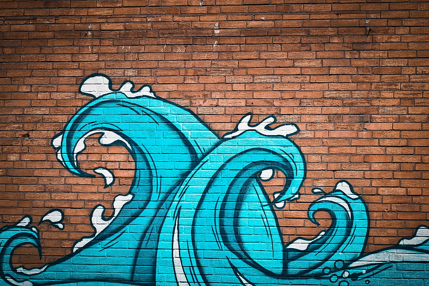 Blue Ocean Wave Graffiti On Red Brick Wall Urban Street Art