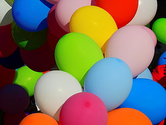Close-up of colorful party balloons in vibrant hues