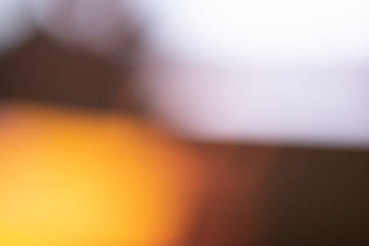 Abstract Blurred Background with Warm Orange and White Gradient